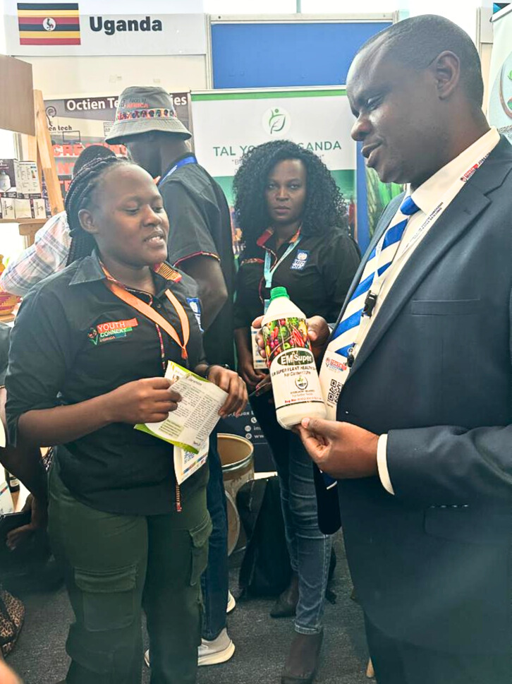 Nassolo Suzan with Minister Balaam Barugahare